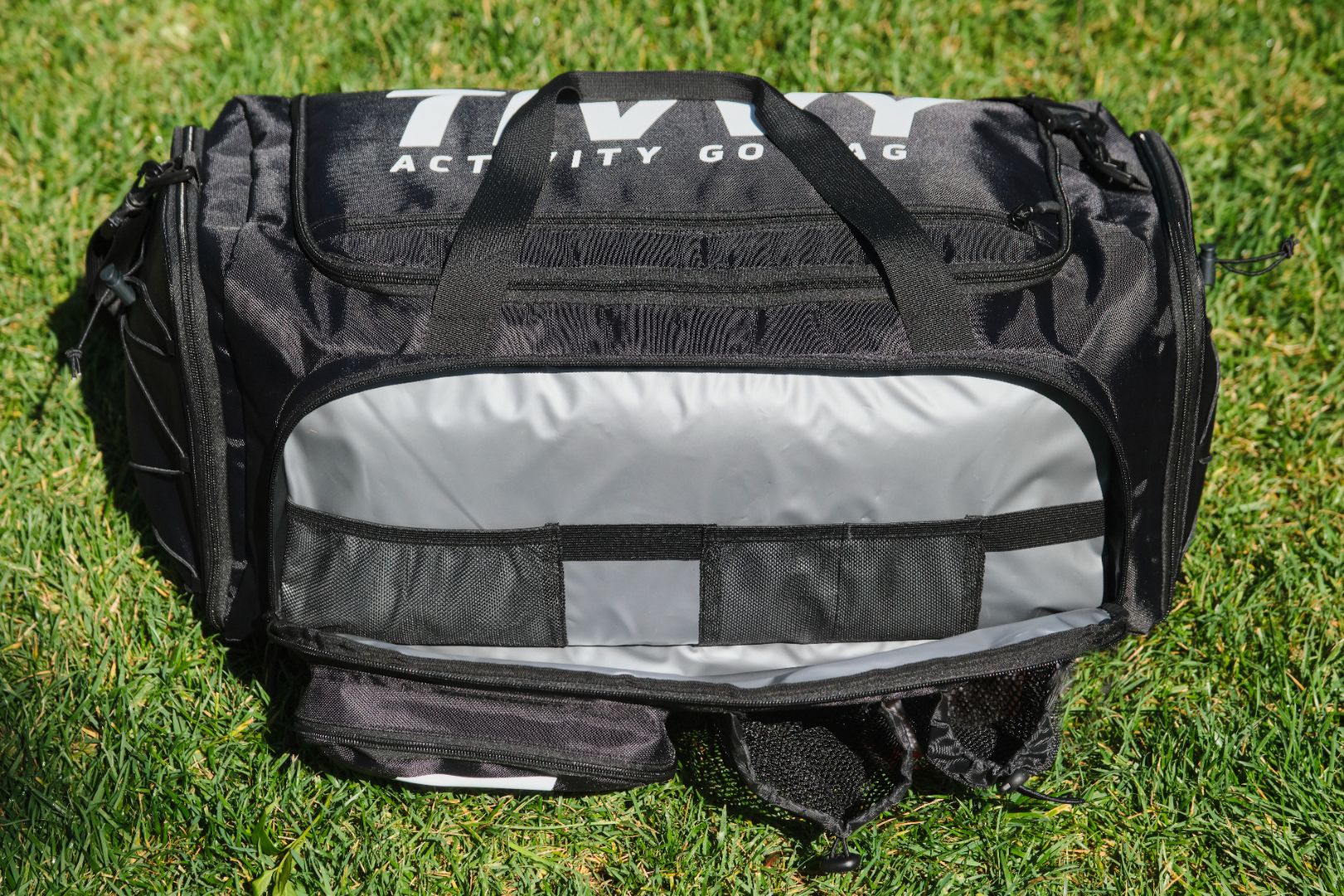 Pre-packed kids sports bag with basketball soccer ball football and outdoor gear